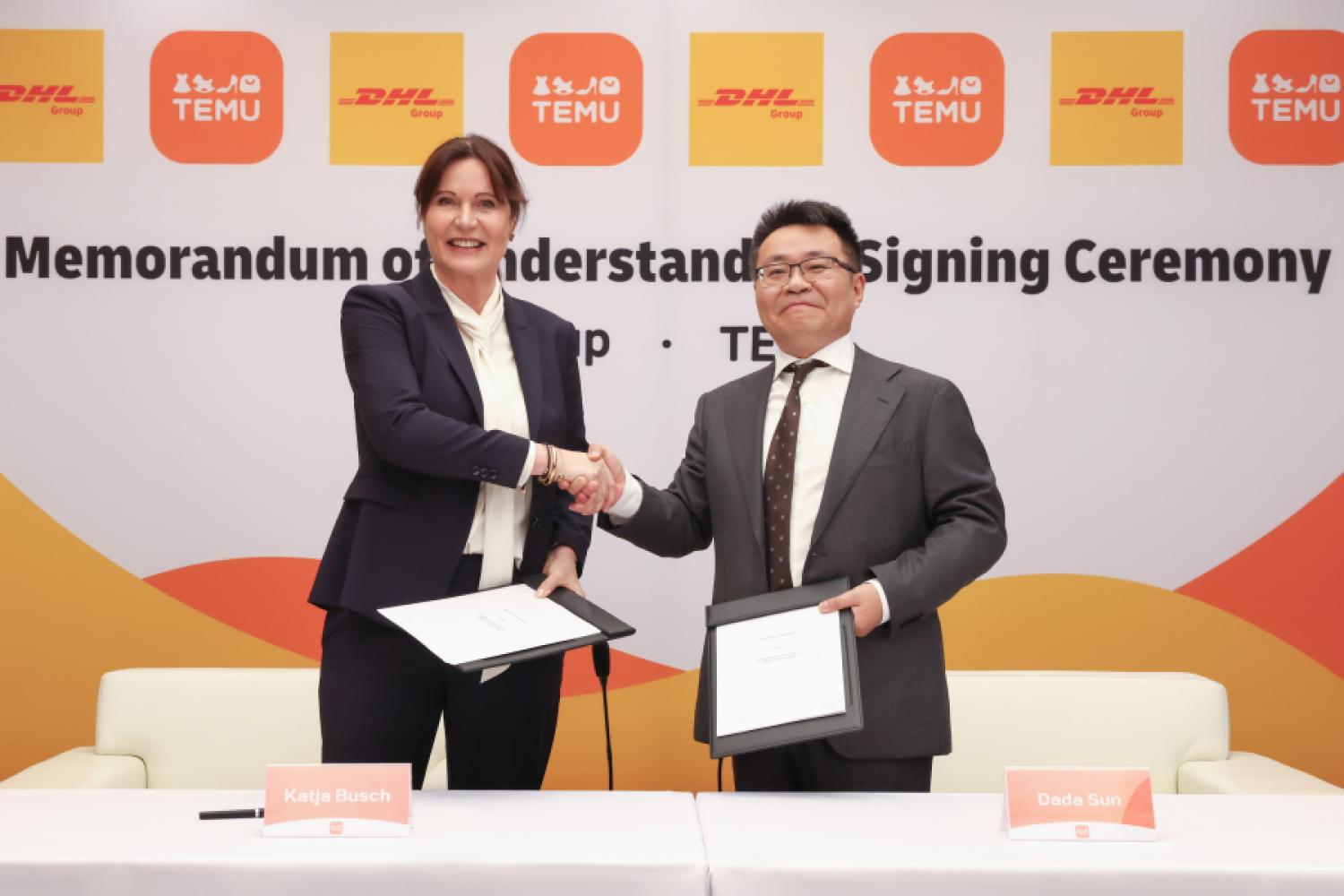 From left to right: Katja Busch, CCO and Head of DHL Customer Solutions & Innovation, and Qin (Dada) Sun, co-founder of Temu, agree on a Memorandum of Understanding to implement Temu's local-to-local model. (Image: DHL Group)