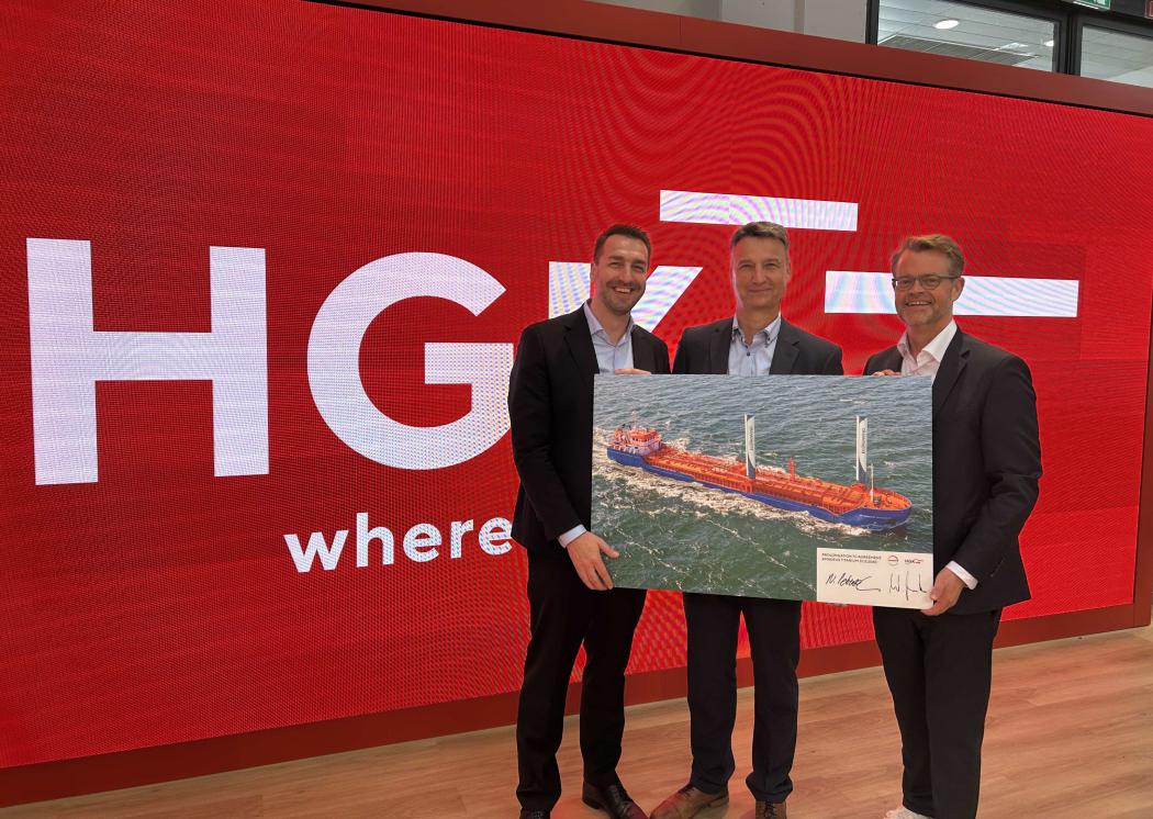 Continue their collaboration for resource-conserving transport logistics in coastal waters until 2040. From left to right: Steffen Bauer, CEO of HGK Shipping, Nils Peterzelka, working as Sourcing Manager Regional Bulk Shipping in Logistics Procurement at Covestro, and Wolfgang Nowak, Managing Director of Amadeus Schiffahrts- und Speditions GmbH, in Munich at the sidelines of the contract signing at transport logistic in June 2025. (Image: HGK Shipping